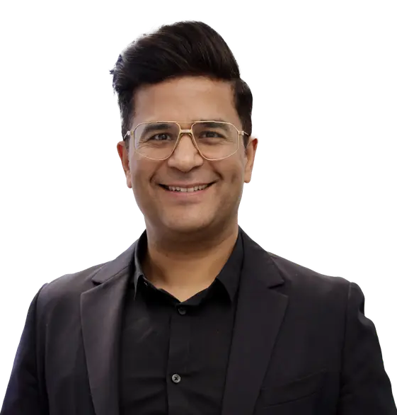 Professional headshot of Dr. Manish Malhotra